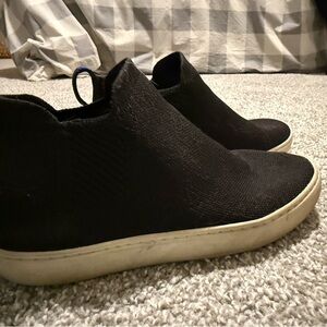 Rothy's Black and Tan Slip-On Shoes